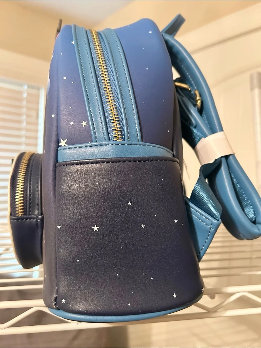 Loungefly Glow in the Dadk Peter Pan Mini Backpack with Clock